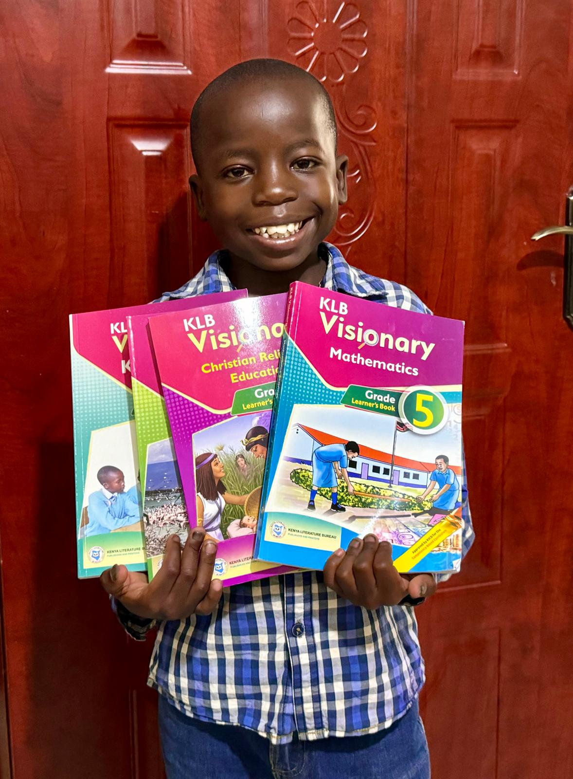 Children featured in the Impact page banner.